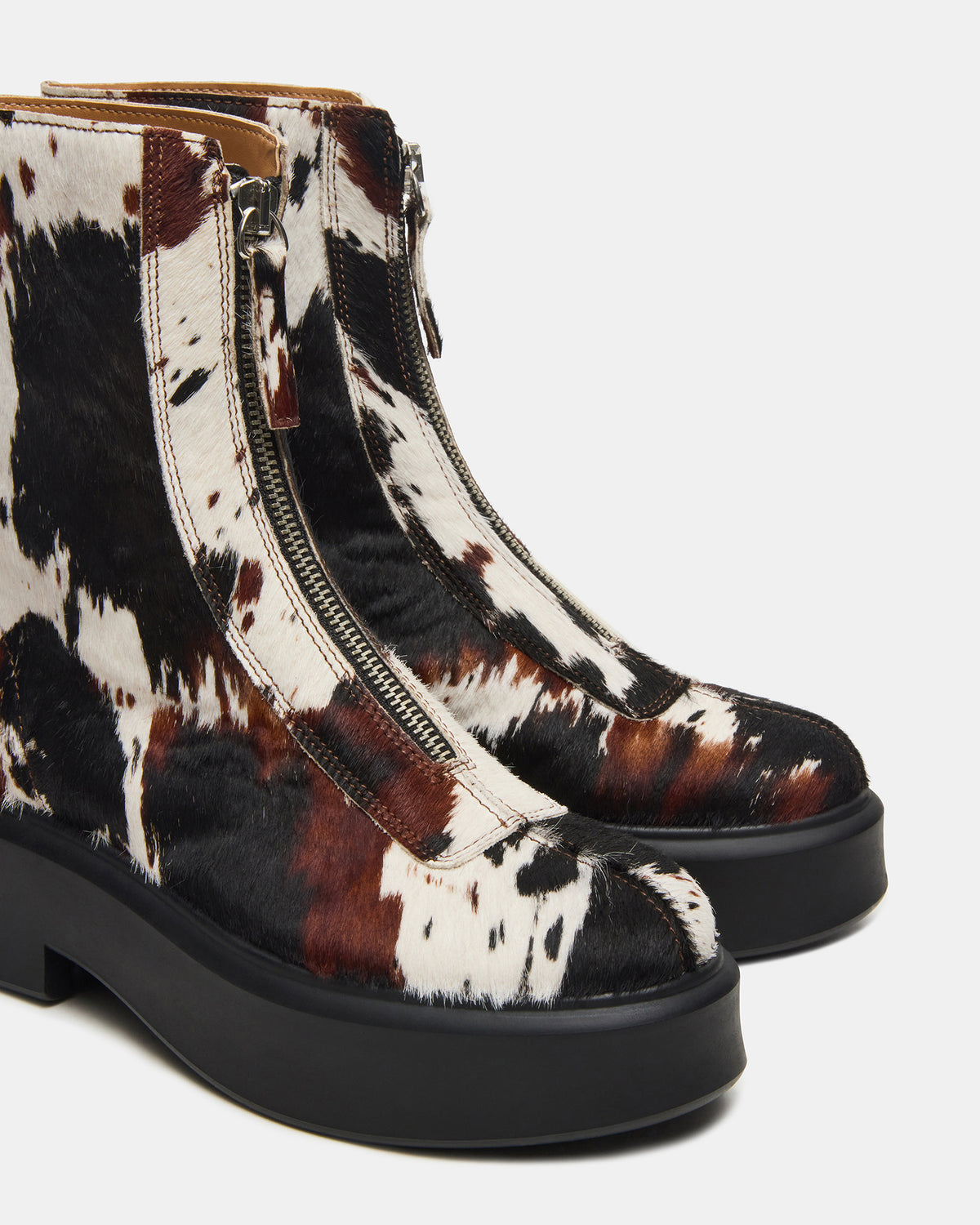 JONES Brown Cow Print Zipper Lug Women's Ankle Boot Steve Madden COW PRINT