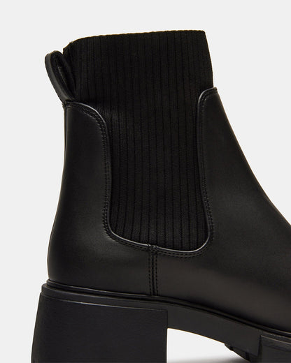 HUTCHH20 Black Water-Resistant Lug Sole Ankle Boot | Women's Booties Steve Madden BLACK